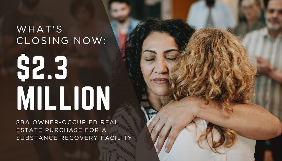 People embracing inside a substance recovery facility representing a $2.3 million SBA owner-occupied real estate loan for a treatment center